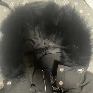 Snap-off hood with shearling trim and multiple pockets